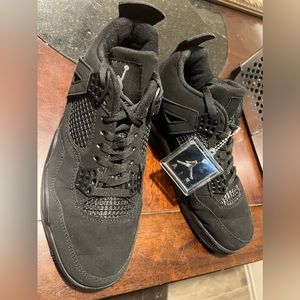 Worn ONE time! Jordan 4 Retro Black Cat sneakers.